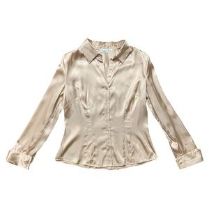 Champagne blouse with cuffed sleeves and collar. Great condition. Size M